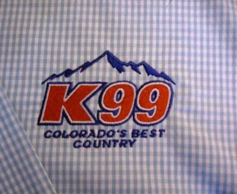 Close-up embroidery threads showing color depth and stitch detail